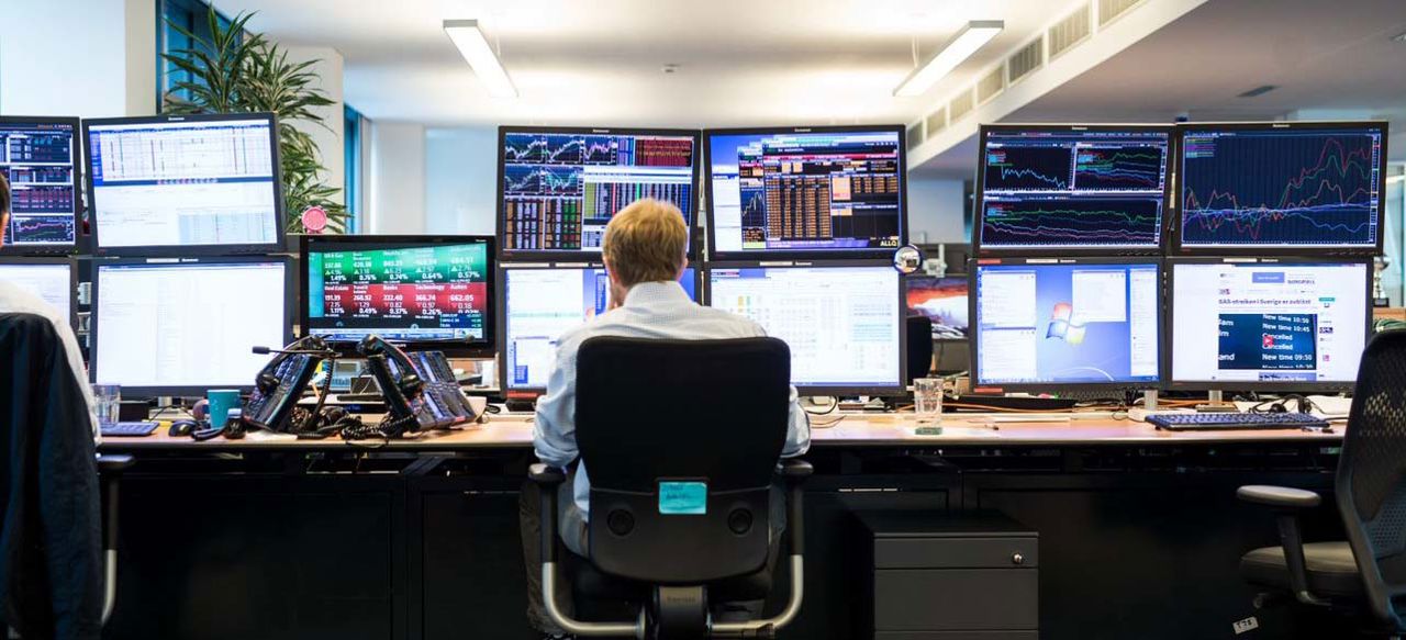 Man working with monitors